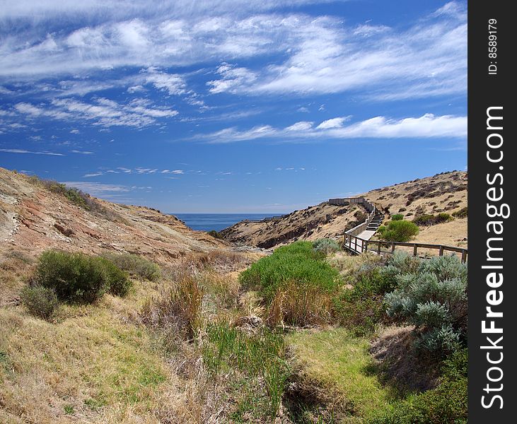 Dry creek valley leading down to the sea. Hallett Cove. Adelaide, South Australia. Dry creek valley leading down to the sea. Hallett Cove. Adelaide, South Australia.