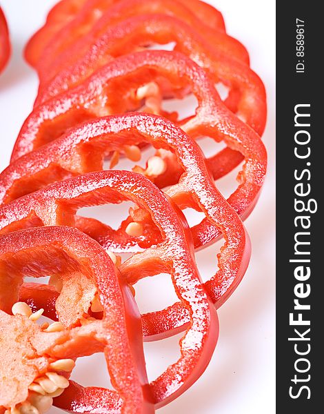 Sliced red pepper isolated on white