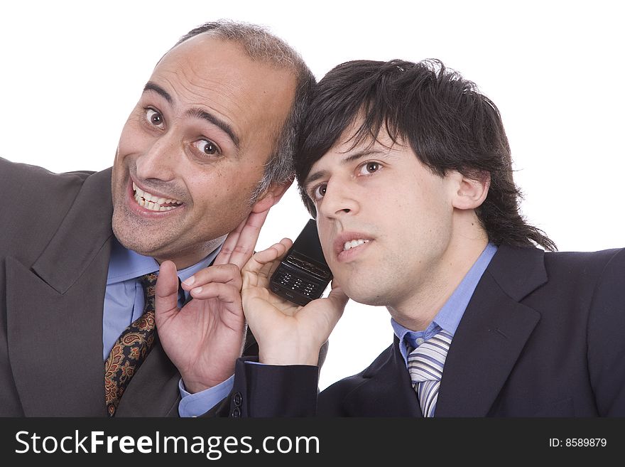 Two successful businessman trying to listen something at a cellphone