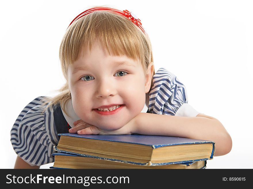 Little girl with book on white background