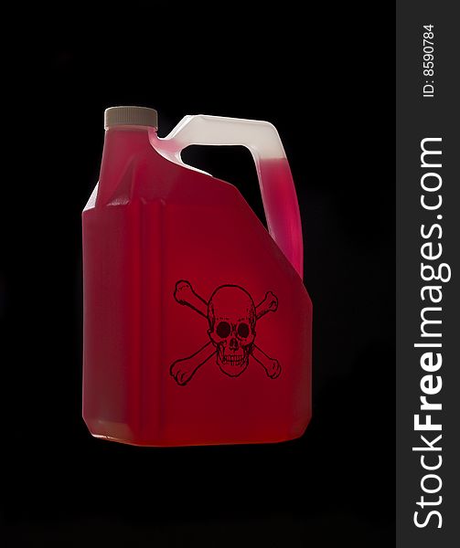 Can with biohazard content towards black background