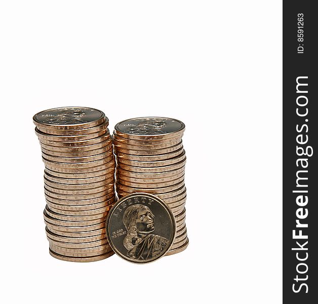 Stack of Coins with one coin turned heads forwards