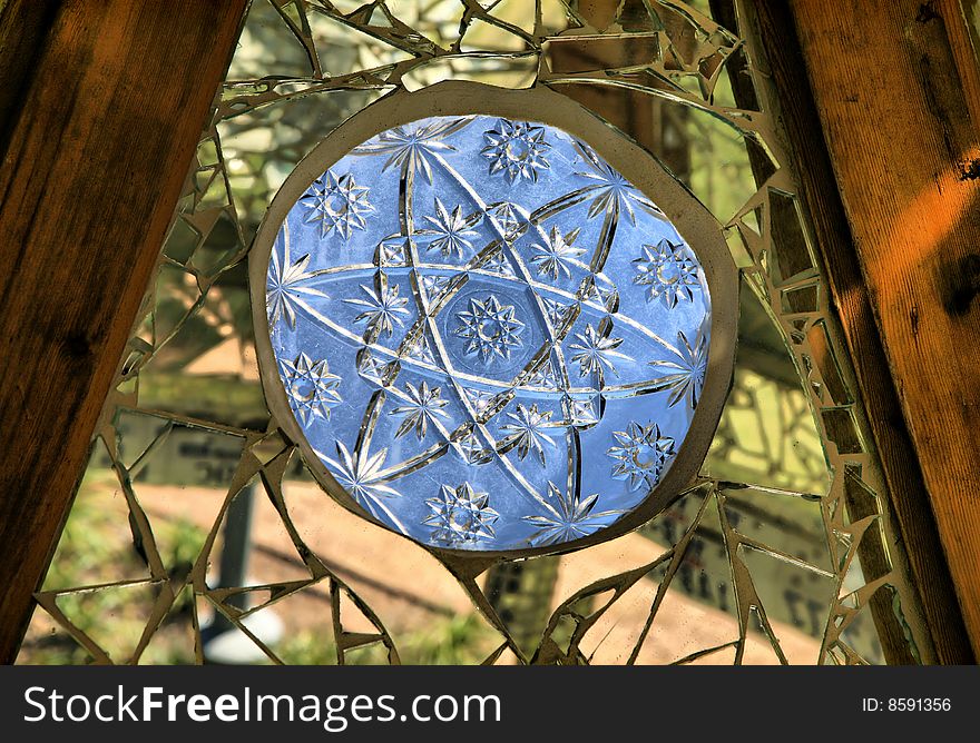 Blue Christmas Star Design Incised into Triangular Glass Window