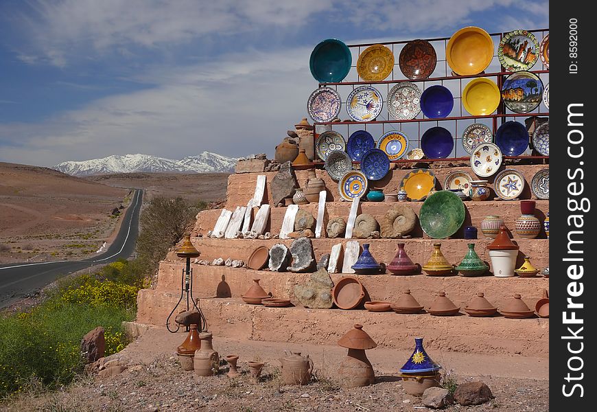 Ceramic bowls merchant near road in high atlas