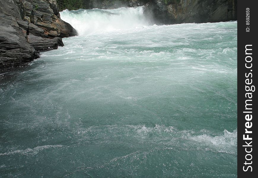 Large green river and rock