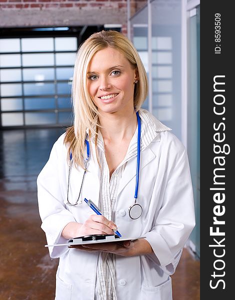 Woman doctor holding a chart in a modern office