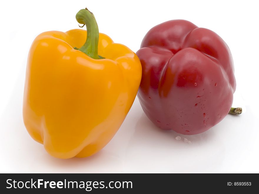 Red and yellow pepper isolated on a white background. Red and yellow pepper isolated on a white background