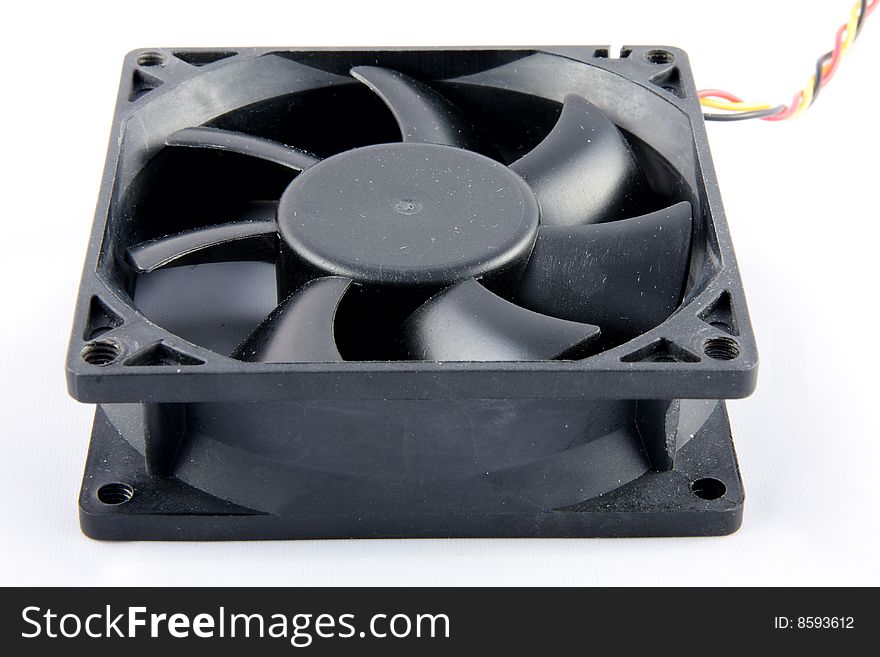 A black plastic 80mm fan isolated on a white background. A black plastic 80mm fan isolated on a white background