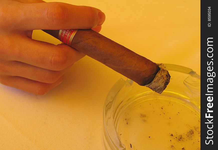 Large cuban cigar in a ashtray