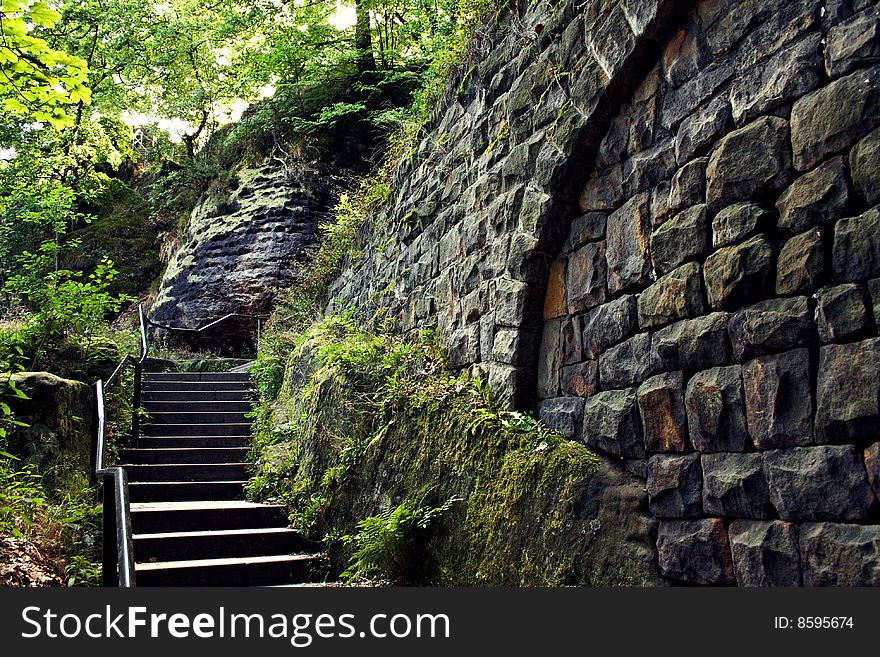 Wall and steps in the forest of germany