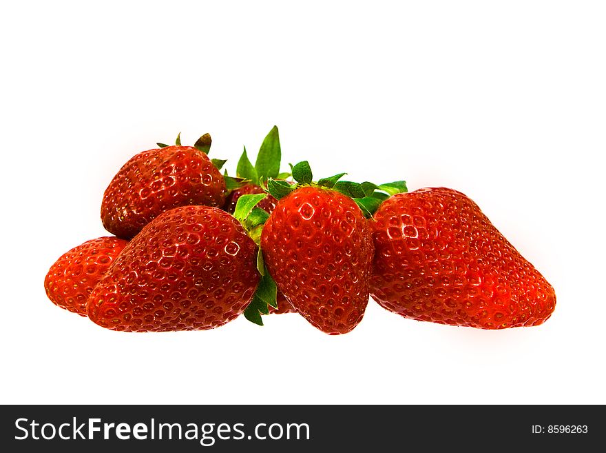Several large and red sweet strawberries. Several large and red sweet strawberries.
