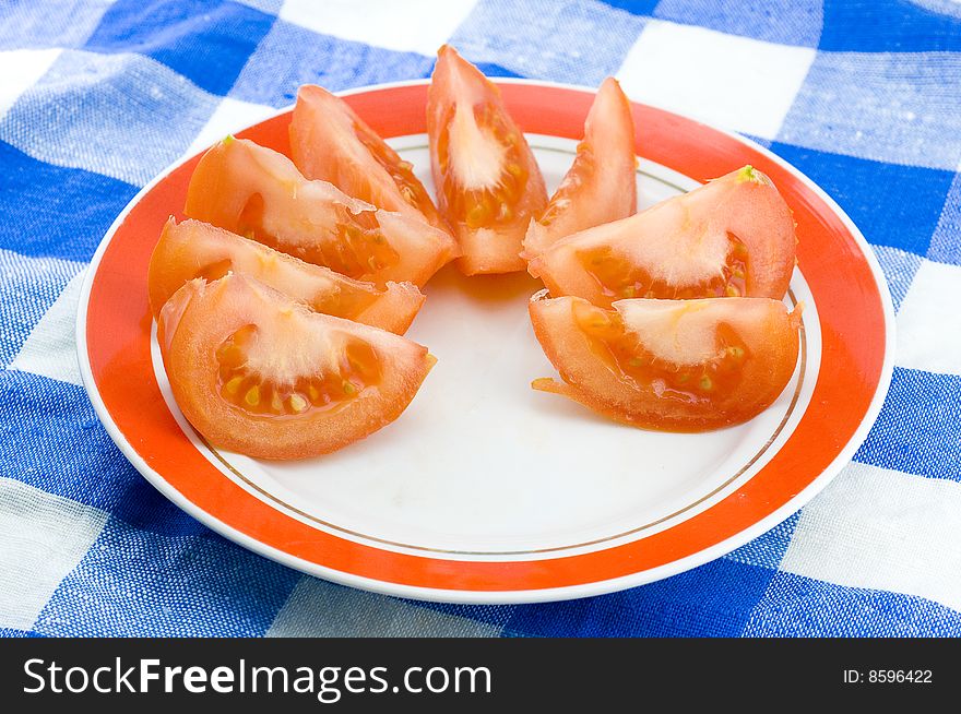 Fresh tomato on dinner table