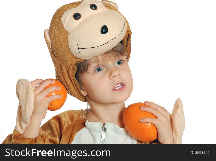 Portrait of a little girl holding two oranges. Portrait of a little girl holding two oranges