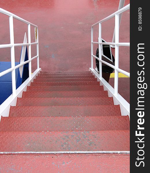 Red steps and white railing