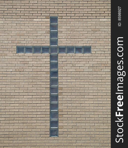 Glass cross in a wall