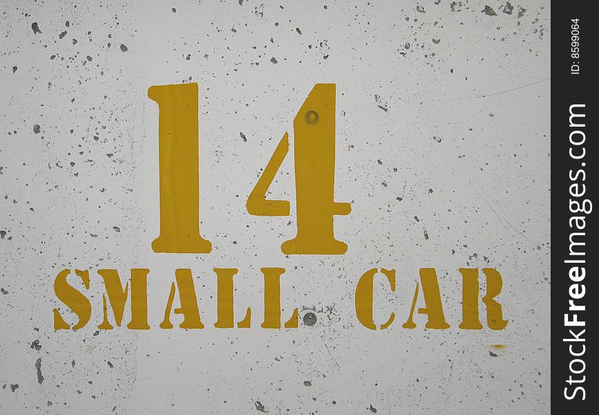 14 small car sign on a wall