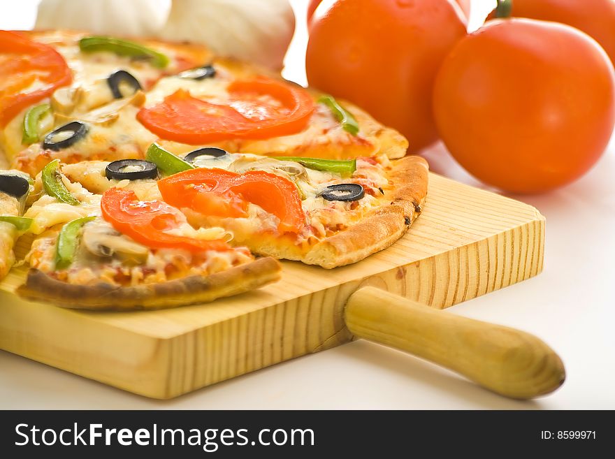 Homemade pizza with fresh tomato olive mushroom cheese isolated. Homemade pizza with fresh tomato olive mushroom cheese isolated