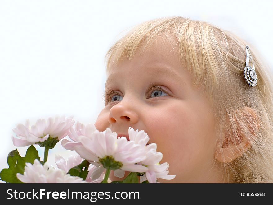 Little girl with a bouquet of flowers