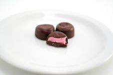 Half Eaten Chocolate On A Plate Royalty Free Stock Photo
