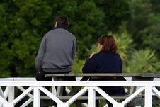 Man And Woman On A Bench Royalty Free Stock Images Man And Woman On A Bench Royalty Free Stock Images