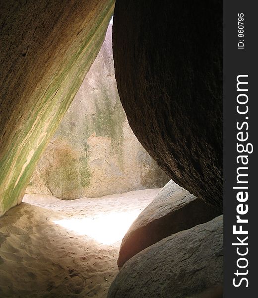 The gigantic granite boulders at The Baths at Virgin Gorda, British Virgin Islands create what seem like caves with light piercing through in various places. If you can, please leave a comment about what you are going to use this image for. It'll help me for future uploads. The gigantic granite boulders at The Baths at Virgin Gorda, British Virgin Islands create what seem like caves with light piercing through in various places. If you can, please leave a comment about what you are going to use this image for. It'll help me for future uploads.