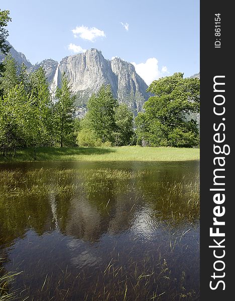 Nice reflection in a meadow in Yosemite valley, California. Nice reflection in a meadow in Yosemite valley, California