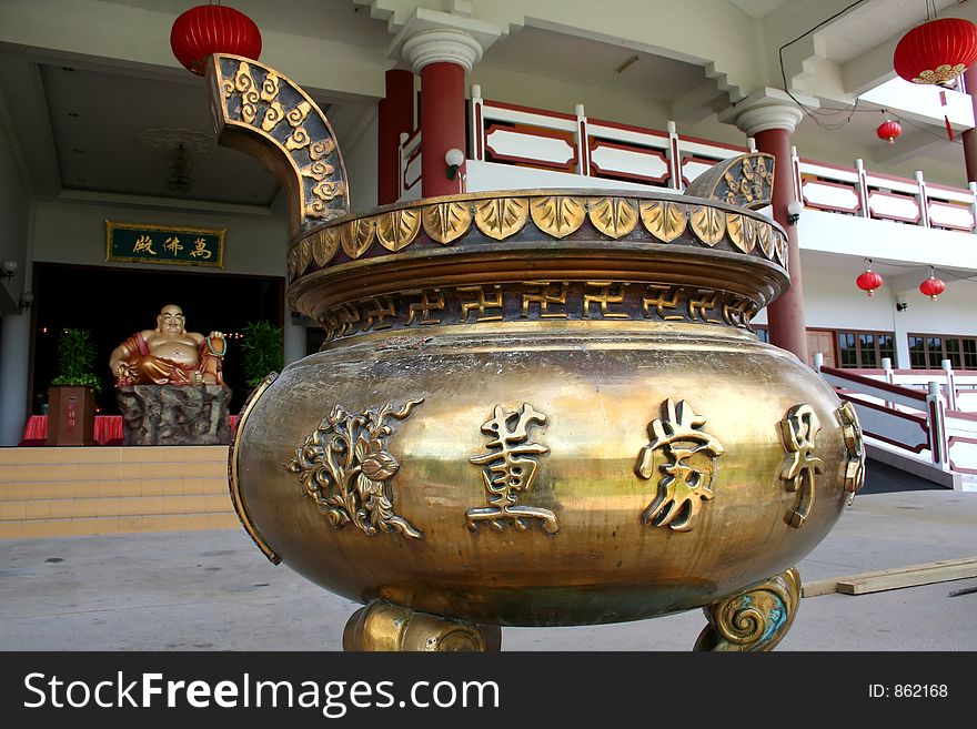 Brass incense holder in a chinese temple. Brass incense holder in a chinese temple