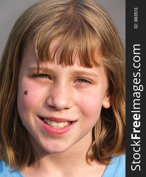 Cute Girl with a lady bug on her cheek.  Fine detail.  Can be used with back to school ads.  I love this girl with all of my heart. She was taken away by her mom when we split up and I was her step-dad so I have no rights.  She is an angel in my memories. Cute Girl with a lady bug on her cheek.  Fine detail.  Can be used with back to school ads.  I love this girl with all of my heart. She was taken away by her mom when we split up and I was her step-dad so I have no rights.  She is an angel in my memories.