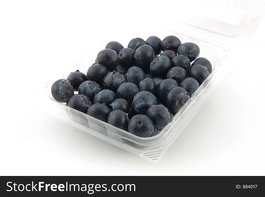Blueberries in box, isolated white