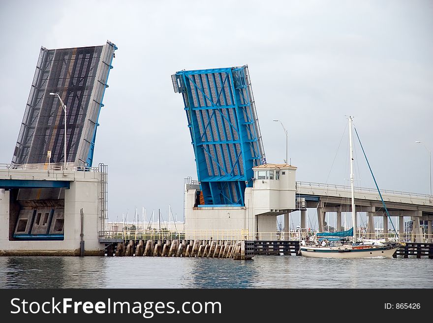 Open drawbridge allowing sailboat to pass