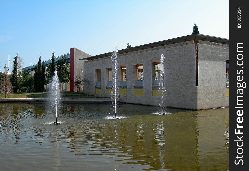 Three water spurts in an artificial lake