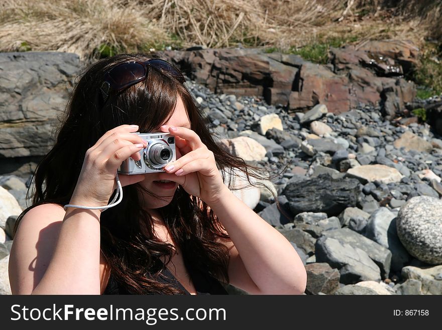 Woman Taking Photos With Camera