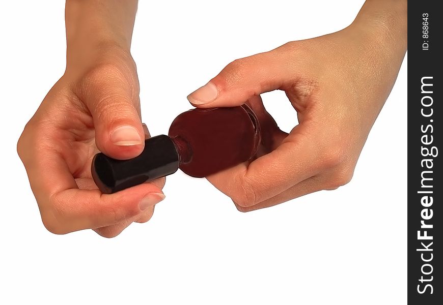 Woman hands with a nail-polish bottle,isolation over white background with clipping path. Woman hands with a nail-polish bottle,isolation over white background with clipping path.