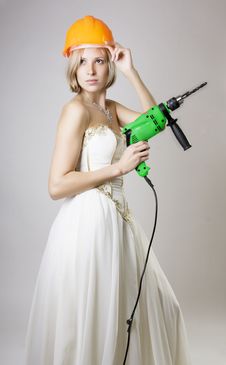Girl In Evening Dress With A Drill Stock Photos Girl In Evening Dress With A Drill Stock Photos