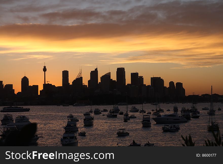 Beautiful looking cloud above Sydney Building - Sun Set. Beautiful looking cloud above Sydney Building - Sun Set