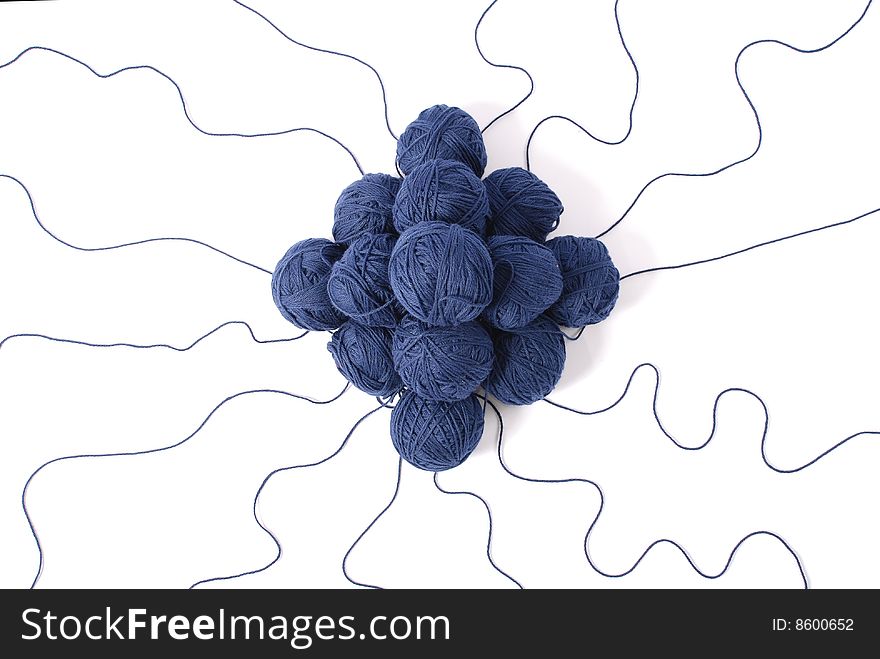 Blue threads and clews  isolated on a white background. Blue threads and clews  isolated on a white background