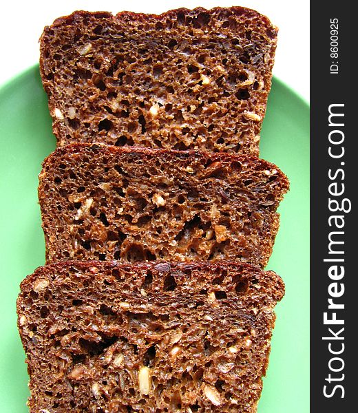 Useful and tasty bread with sunflower seeds. Black bread.