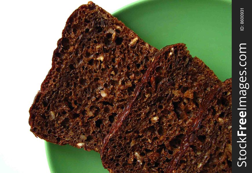 Useful and tasty bread with sunflower seeds. Black bread.