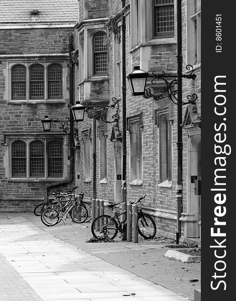 Some bicycles parked outside a building. Some bicycles parked outside a building