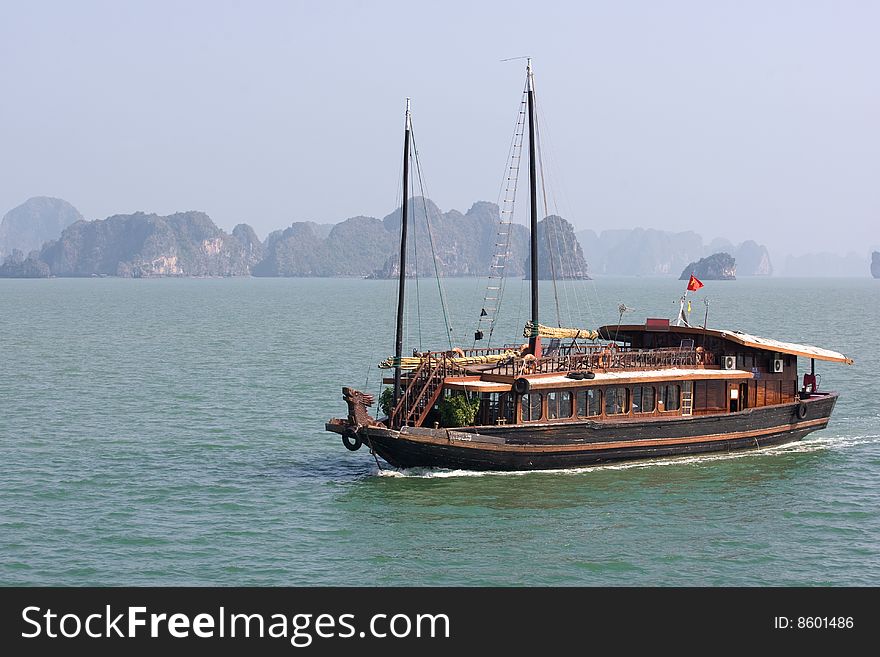 Boat and Islands in Halong Bay, Northern Vietnam