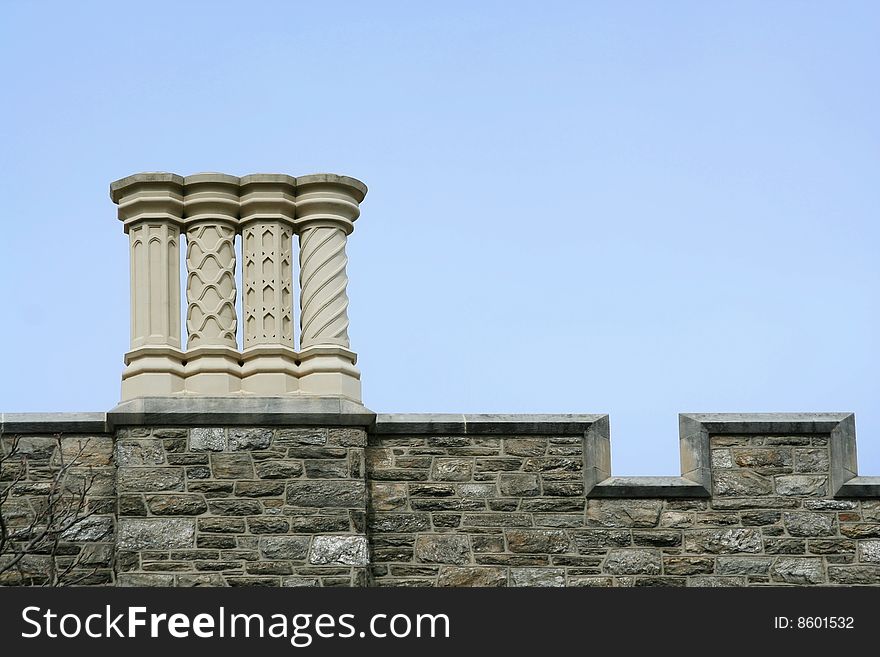 Some old chimneys on a roof. Some old chimneys on a roof