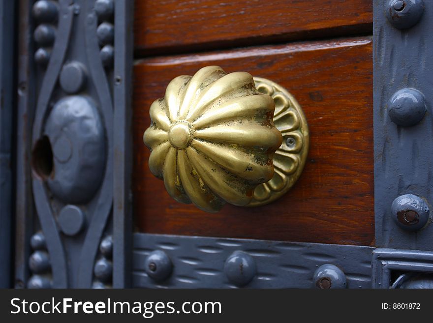 Budapest - Hungary.Ancient wood door with gold. Budapest - Hungary.Ancient wood door with gold