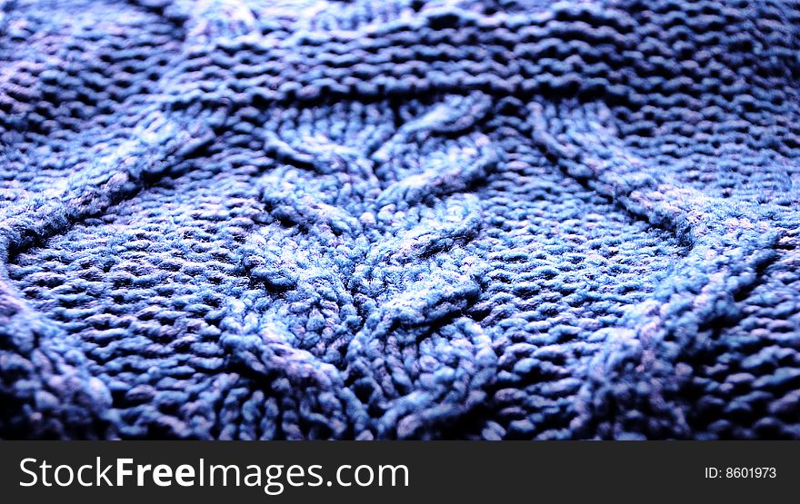 Knitted texture of blue color, pigtail. Knitted texture of blue color, pigtail