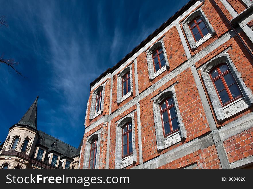 Building in construction, yard, blue sky, architecture