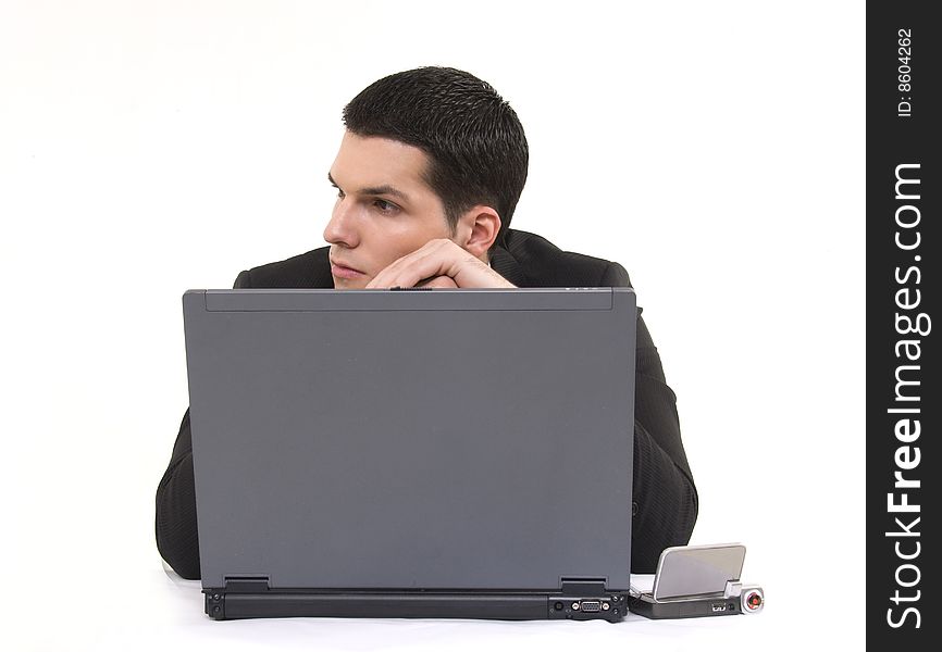 Businessman with lap top computer and phone isolated on white background