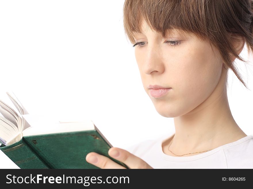 Young woman reading the book