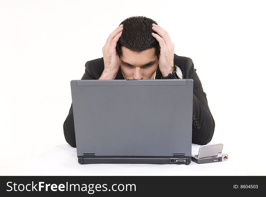 Businessman with lap top computer and phone isolated on white background