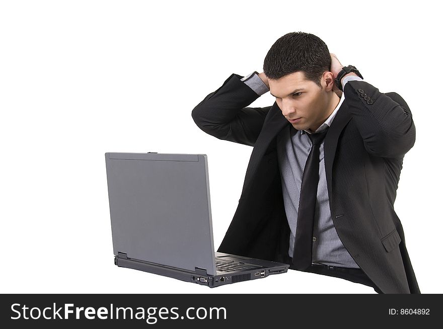 Businessman with lap top computer and phone isolated on white background