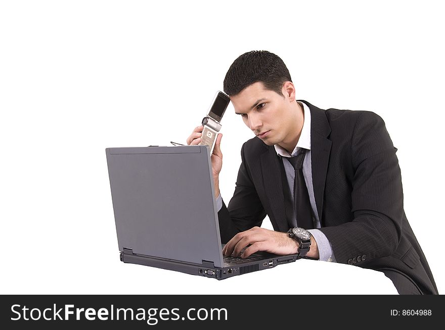 Businessman With Lap Top Computer And Phone