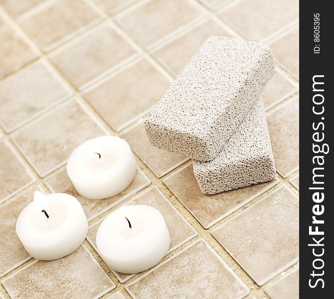 Spa display against a stone tile backdrop.